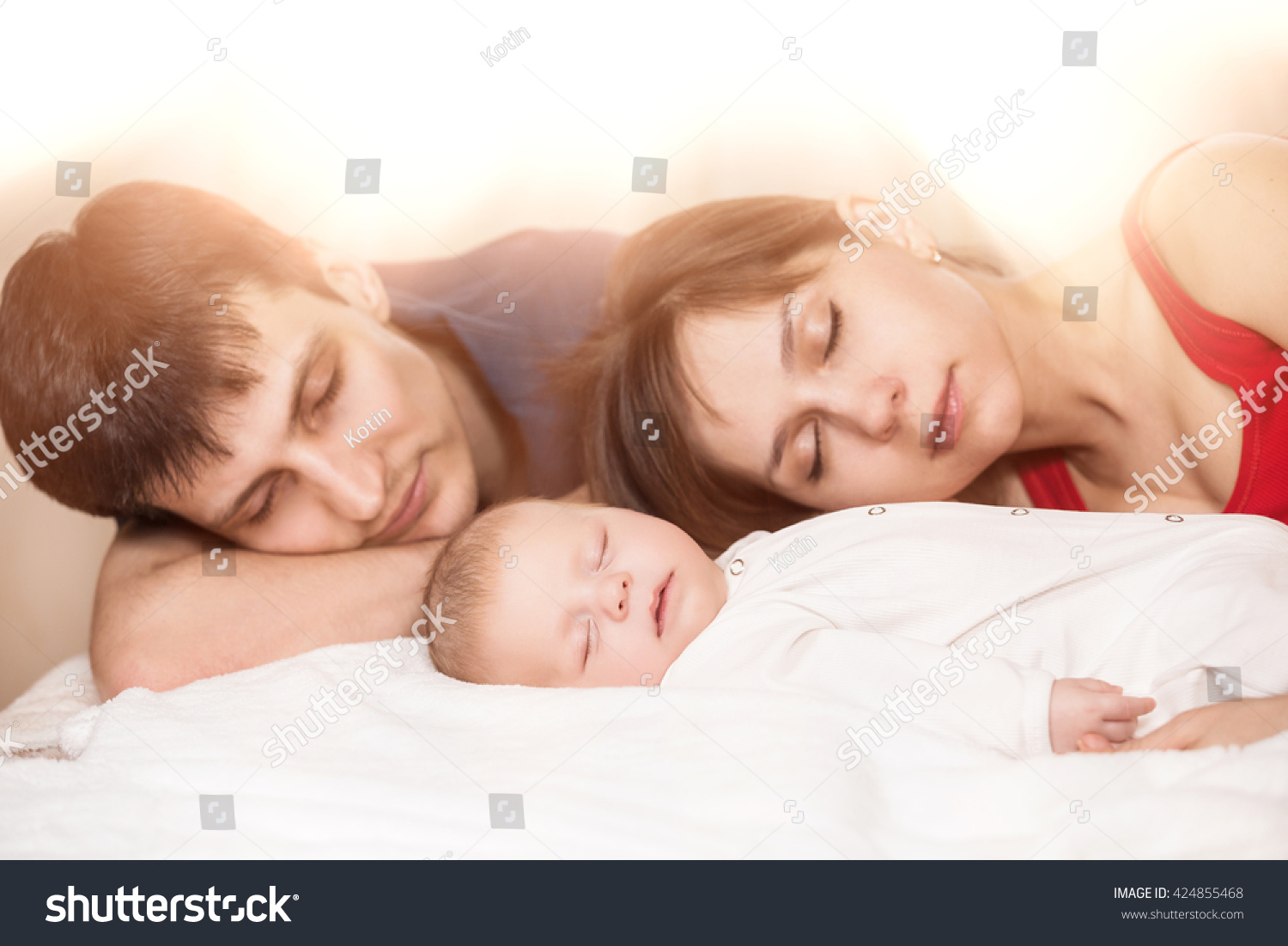 Sleeping Baby With Mom And Dad, Closeup Stock Photo 424855468 ...