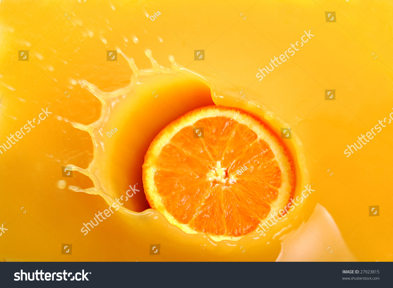 Slice Of Orange Fruit Falling In Juice Stock Photo 27923815 : Shutterstock