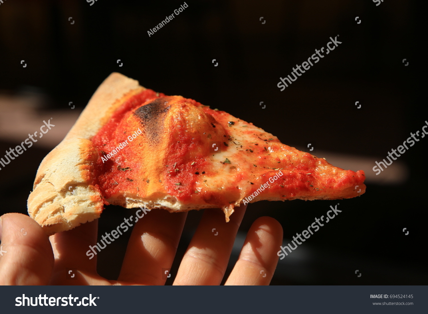 Slice Thin Crust Pizza Held Hand Stock Photo Edit Now