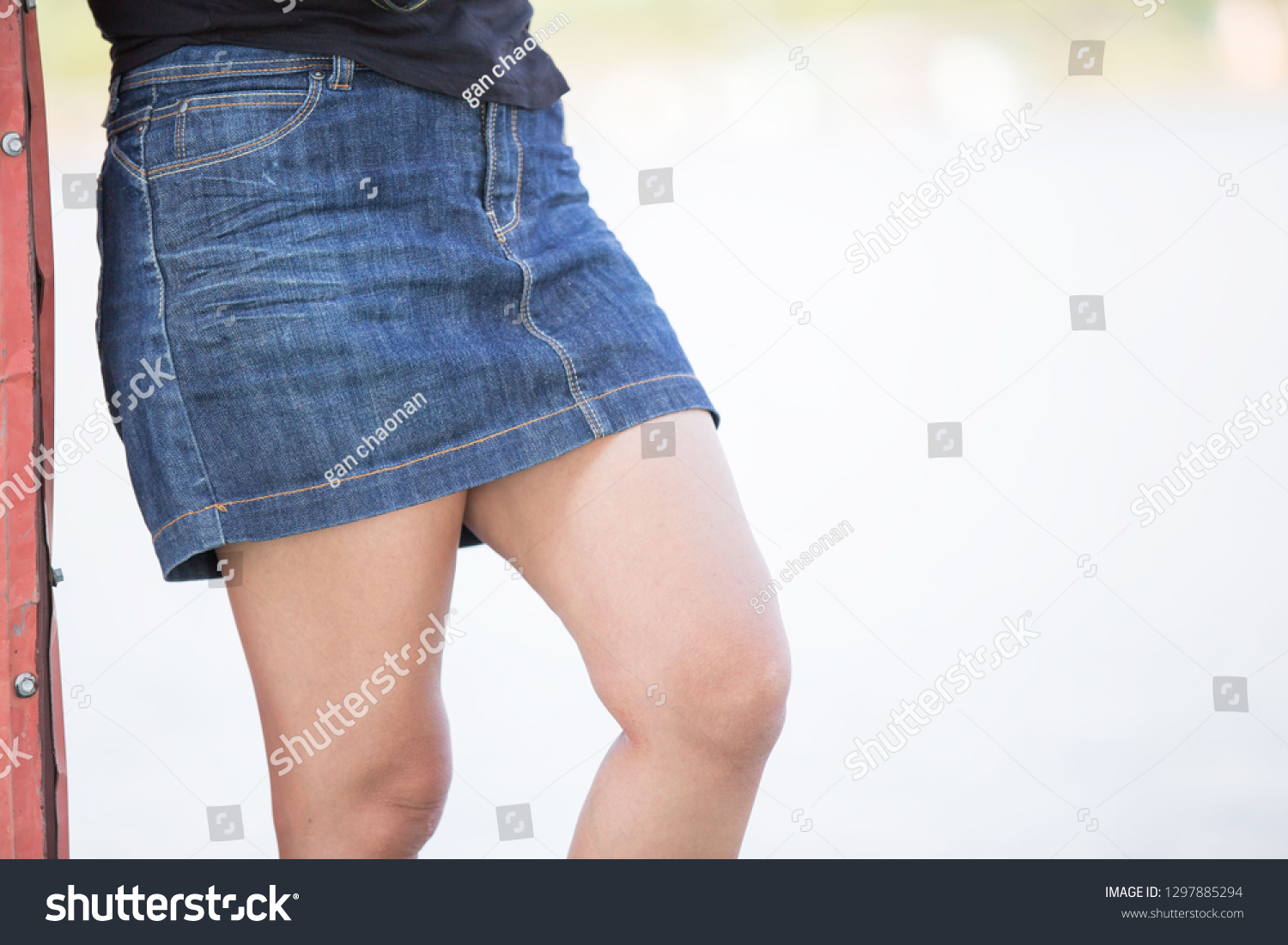 girls in short denim skirts