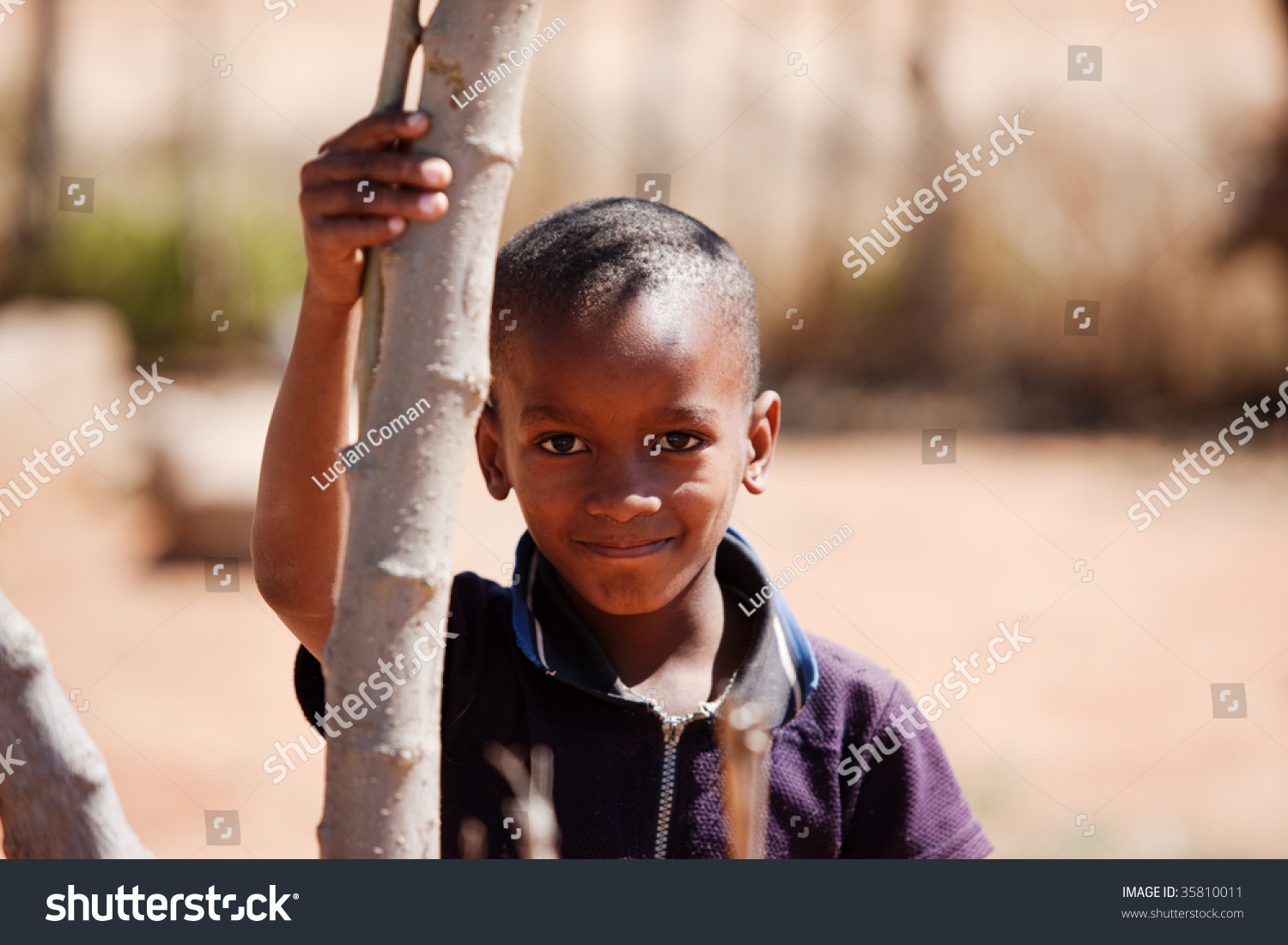 Small African Boy , Outdoors, Holding A Branch Stock Photo 35810011 ...