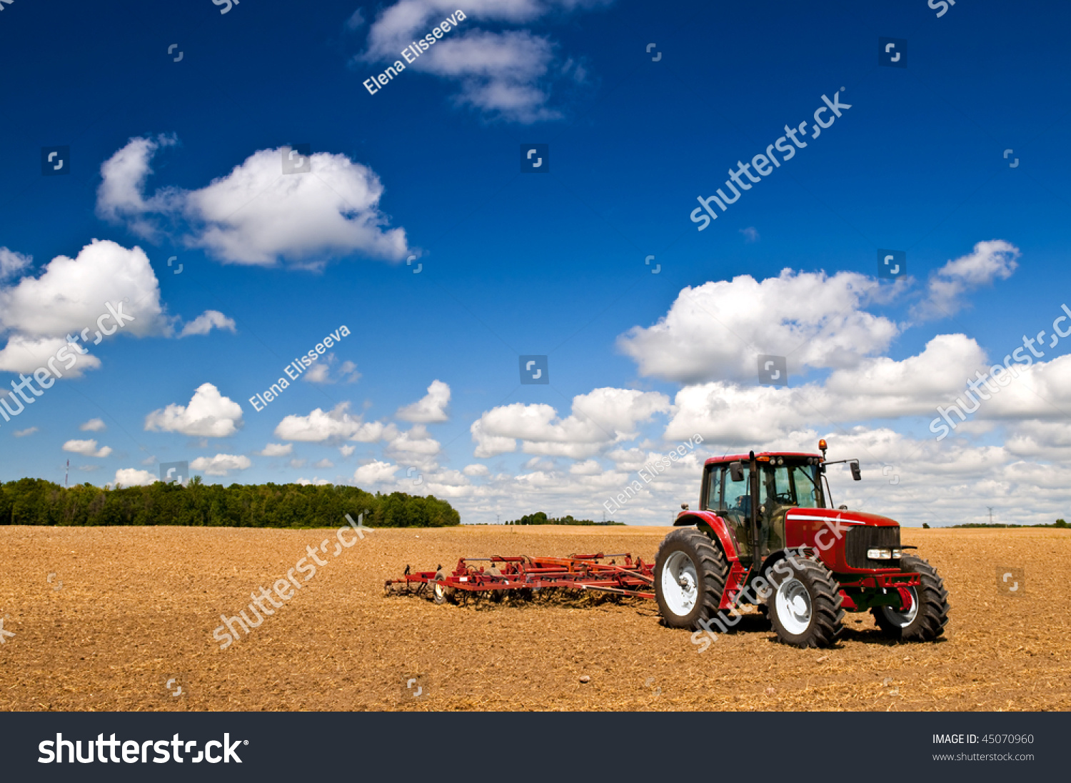 Small Scale Farming With Tractor And Plow In Field Stock Photo 45070960 ...