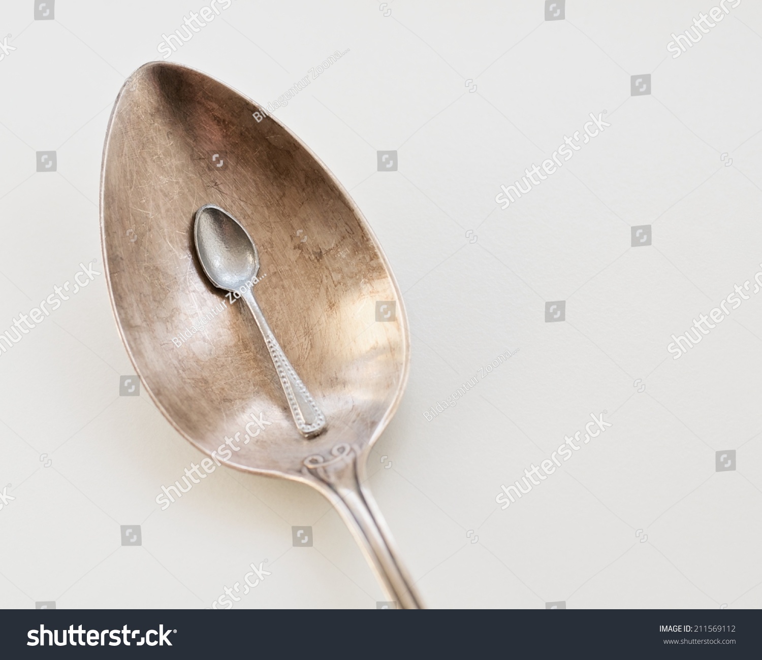 Small Spoon Big Spoon Stock Photo Edit Now