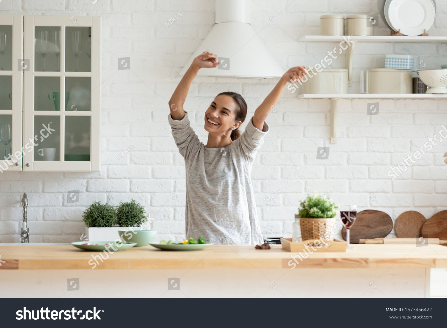 Smiling Beautiful Woman Dancing Modern Kitchen Stock Photo 1673456422   Stock Photo Smiling Beautiful Woman Dancing In Modern Kitchen Preparing Healthy Food Alone Cooking Salad 1673456422 