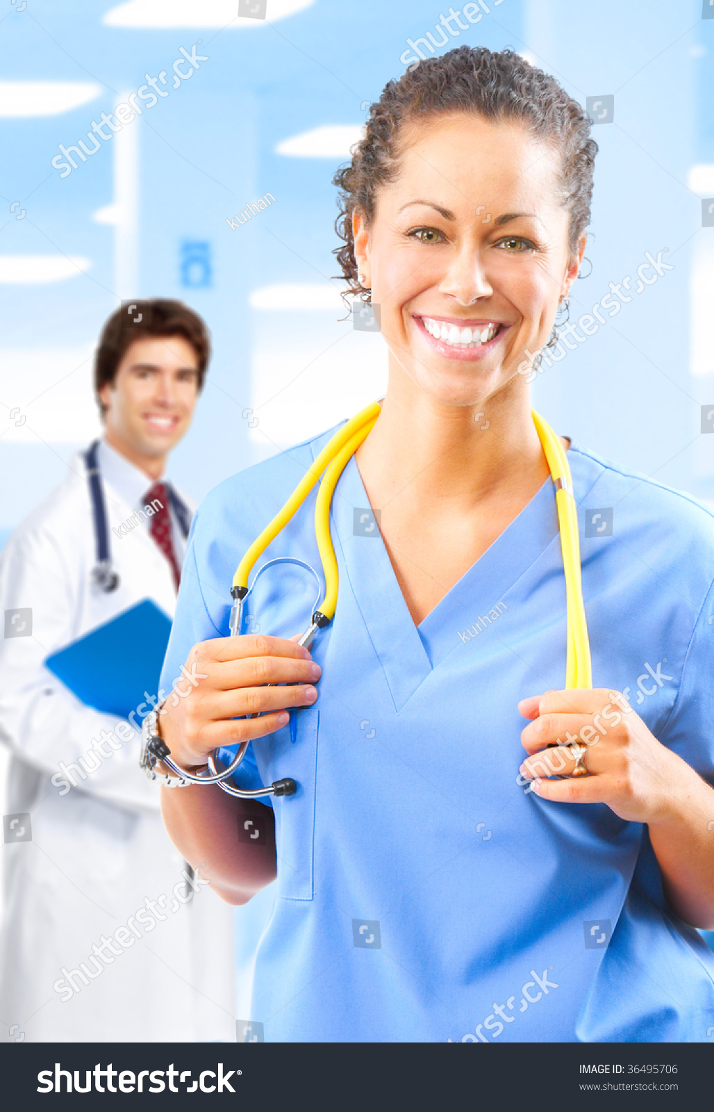 Smiling Medical Doctors With Stethoscopes At The Hospital Stock Photo ...