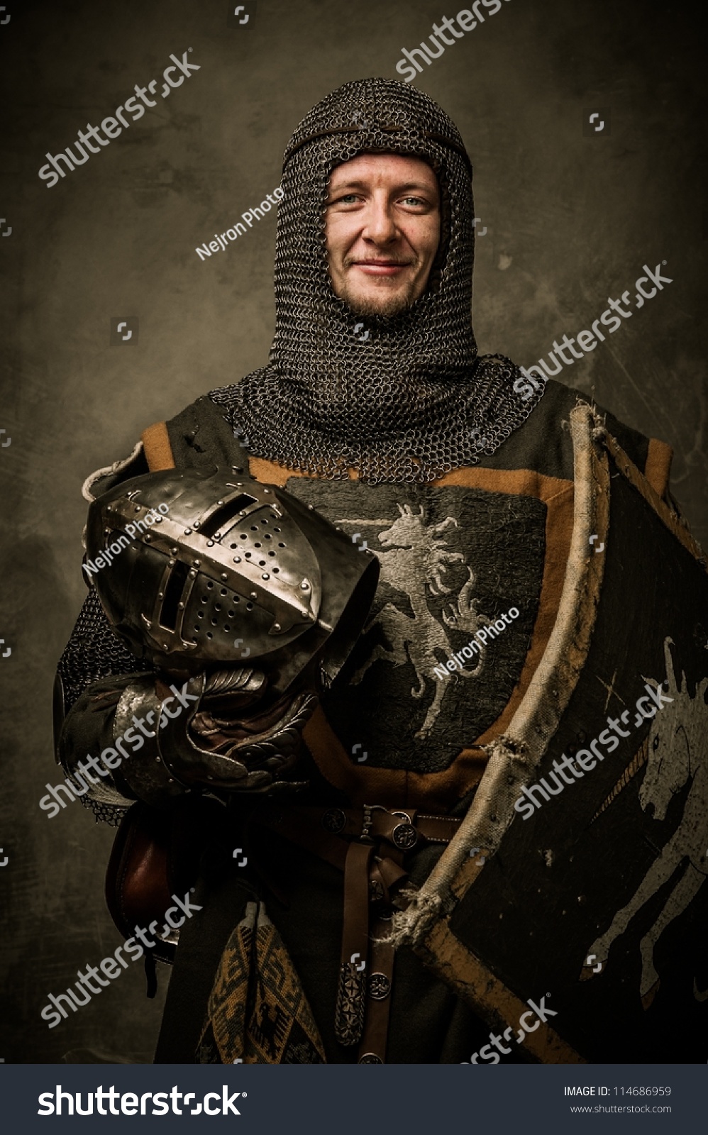 Smiling Medieval Knight Holding Helmet Stock Photo 114686959 : Shutterstock