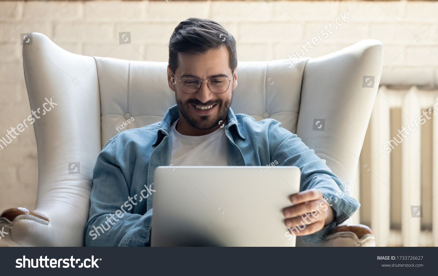 Smiling Millennial Man Glasses Sit Rest Stock Photo 1733726627 ...