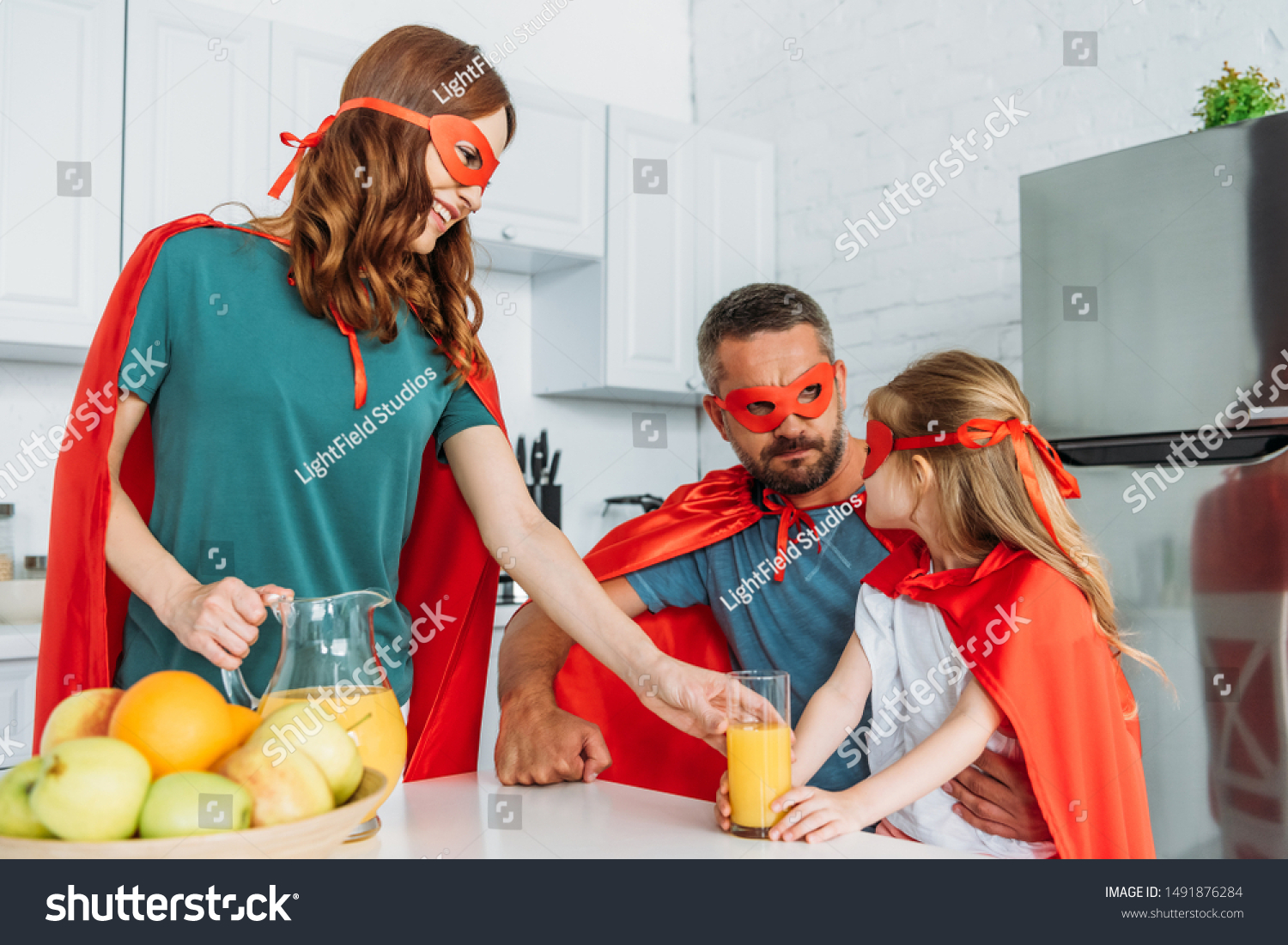 Smiling Mother Father Daughter Costumes Superheroes Stock Photo