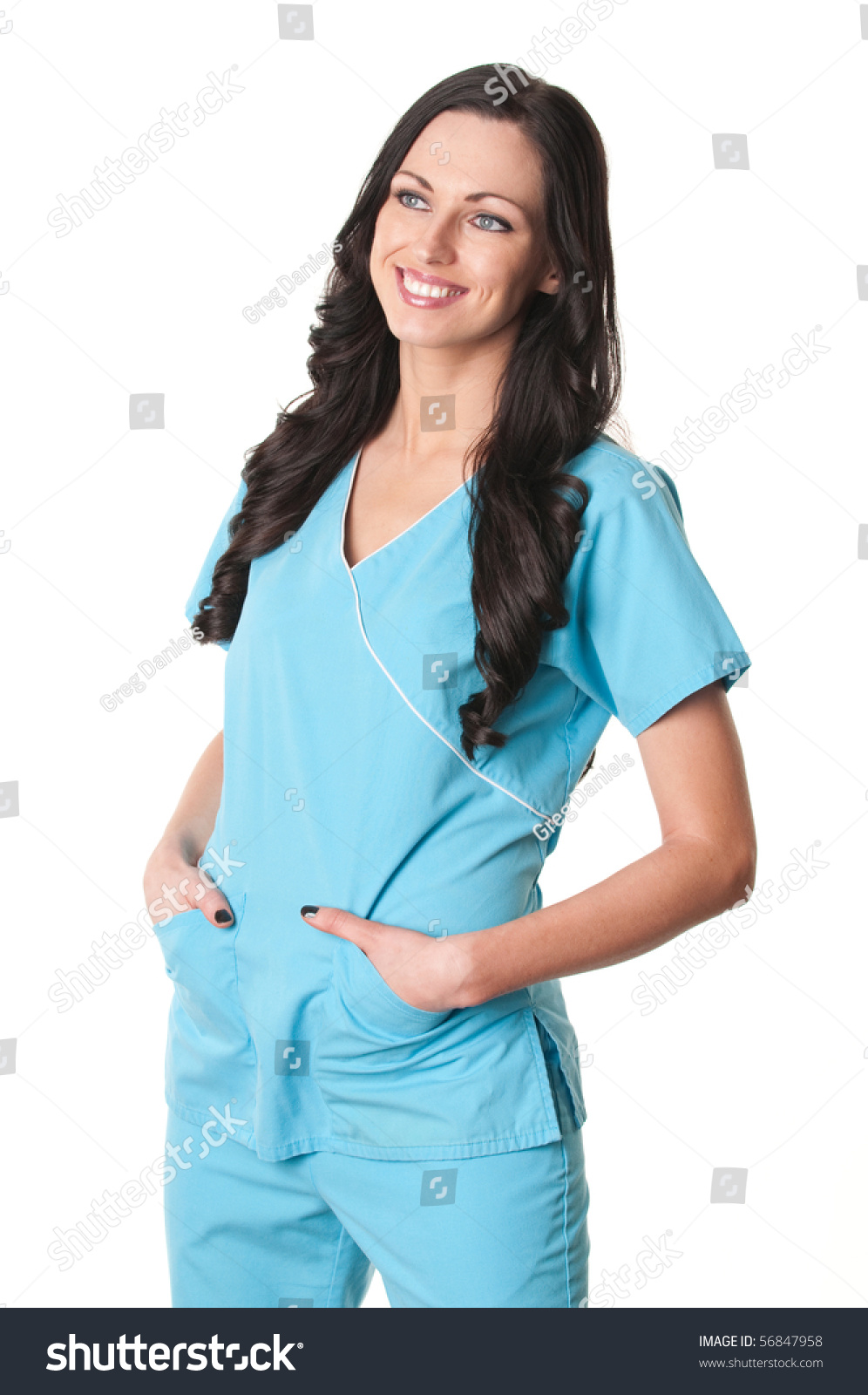 Smiling Nurse In Light Blue Scrubs Isolated On White Stock Photo ...