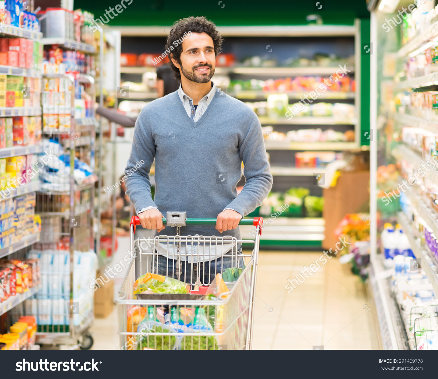 Smiling Woman Shopping In A Supermarket Stock Photo 291469778 ...