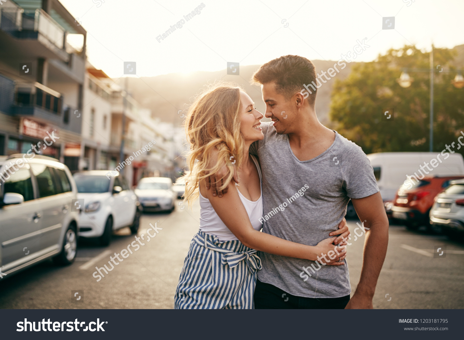 Smiling Young Couple Walking Arm Arm Stock Photo Edit Now