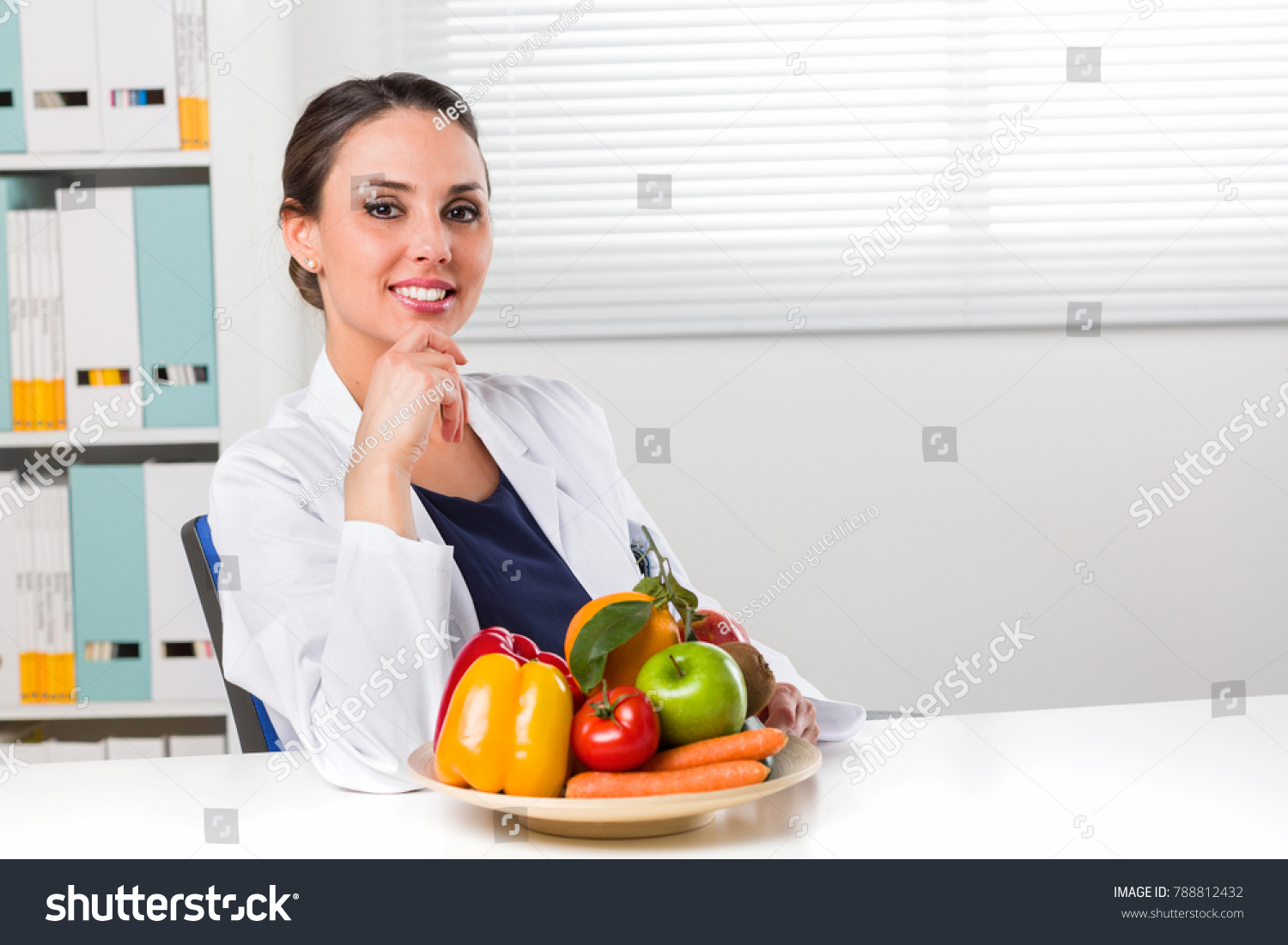 Smiling Young Female Dietitian Sitting Desk Stock Photo 788812432 ...