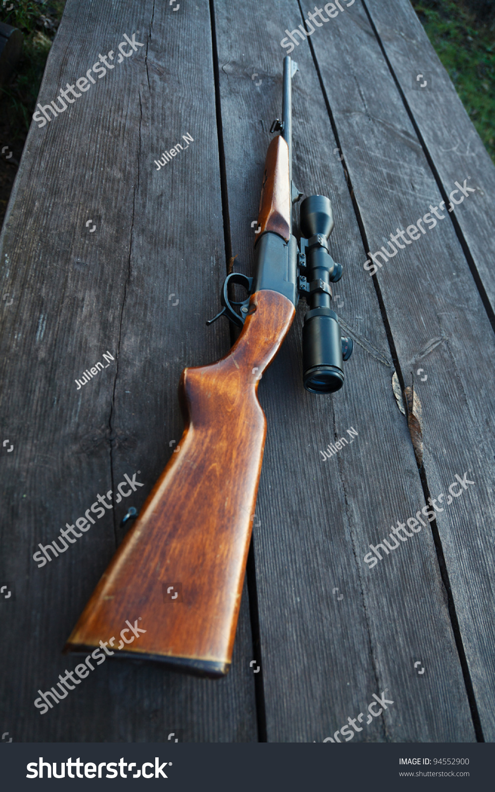 Sniper Rifle With Optical Sight On Wooden Table. Stock Photo 94552900 ...