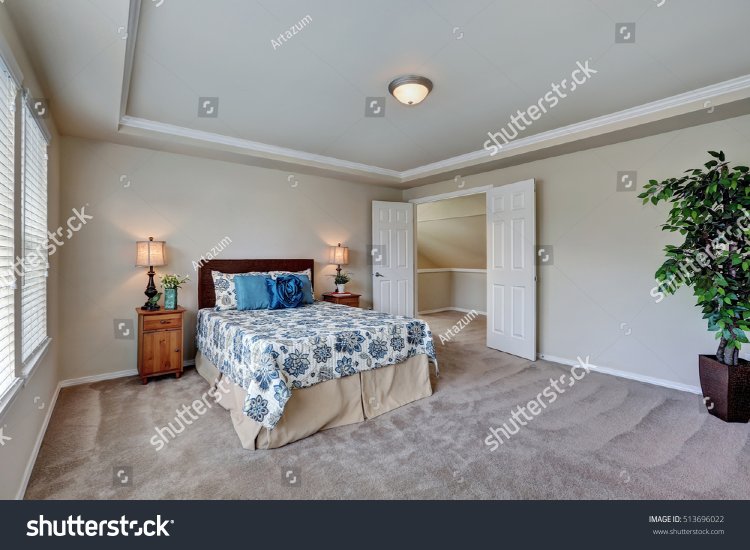 Spacious Bedroom Queen Size Bed Floral Stock Image