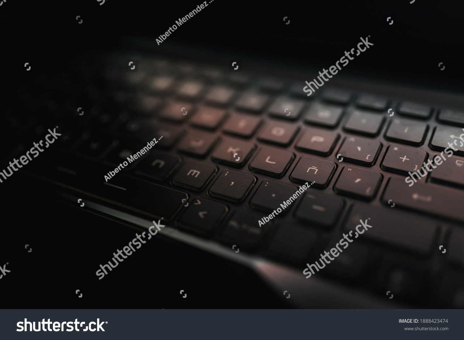 Spanish Laptop Keyboard Illuminated By Screen Stock Photo (Edit Now)  1888423474