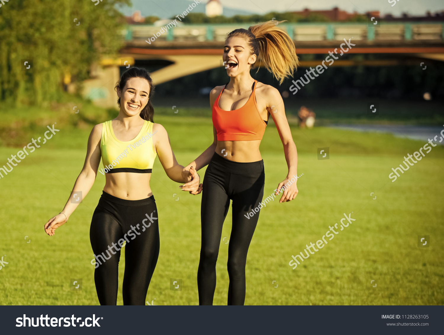 girls running in sports bras