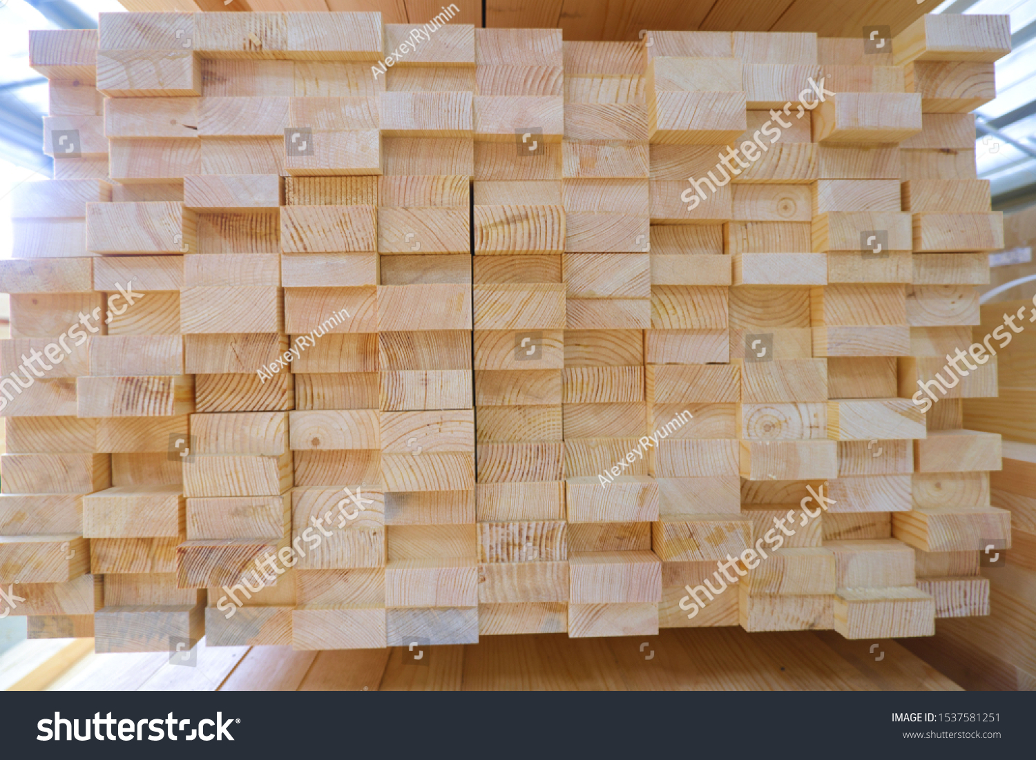 Stack of two-layer wooden glued laminated timber beams from pine finger joint spliced boards for wooden windows
