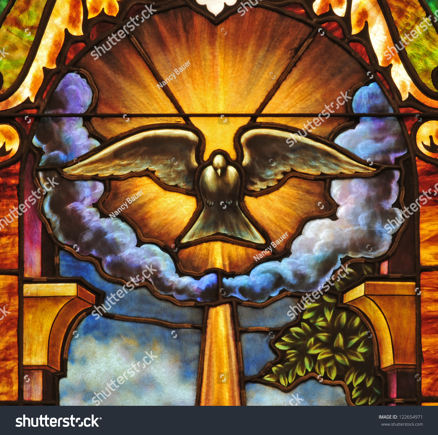 Stained Glass Window Depicting The Holy Spirit In The Form Of A Dove ...