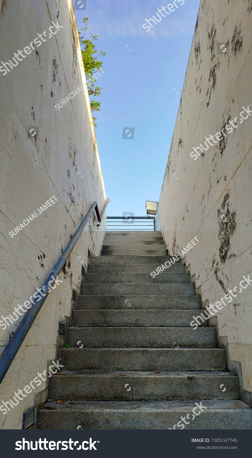 Stairs In Rooftop / A Spiral Staircase Leads To A Rooftop Terrace Hotel