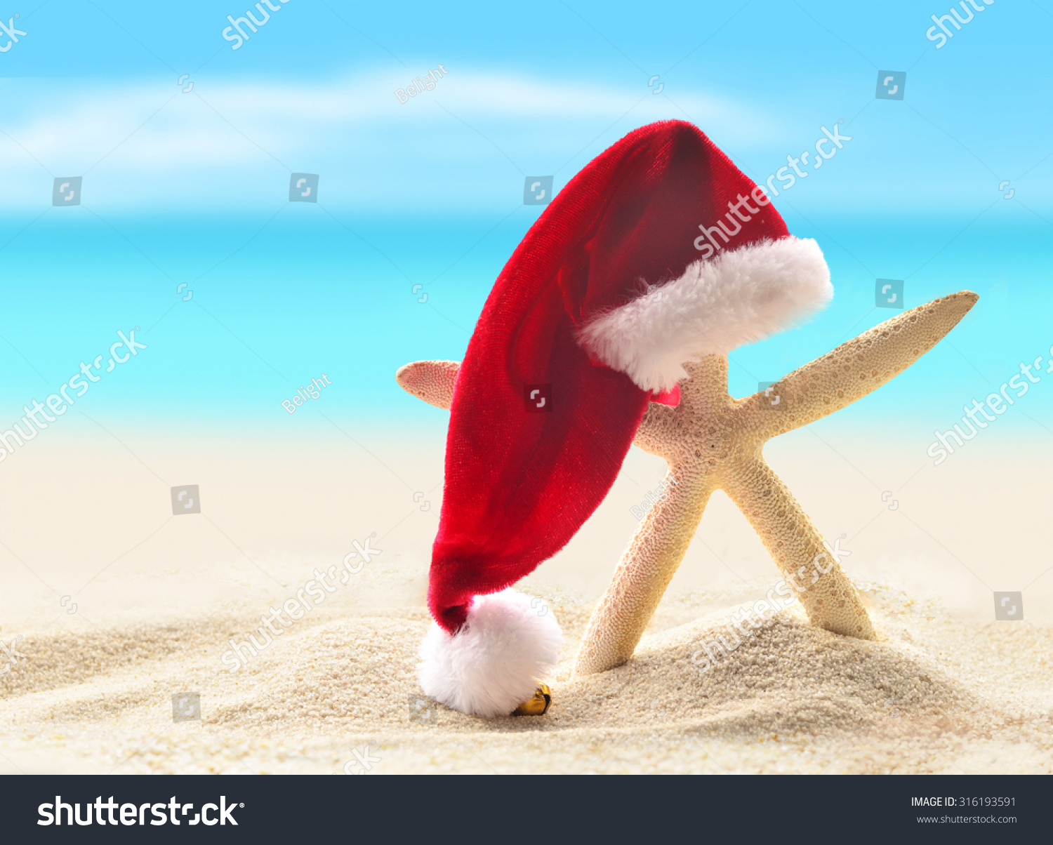 Starfish In Santa Hat On Summer Beach And Merry Christmas Stock Photo ...