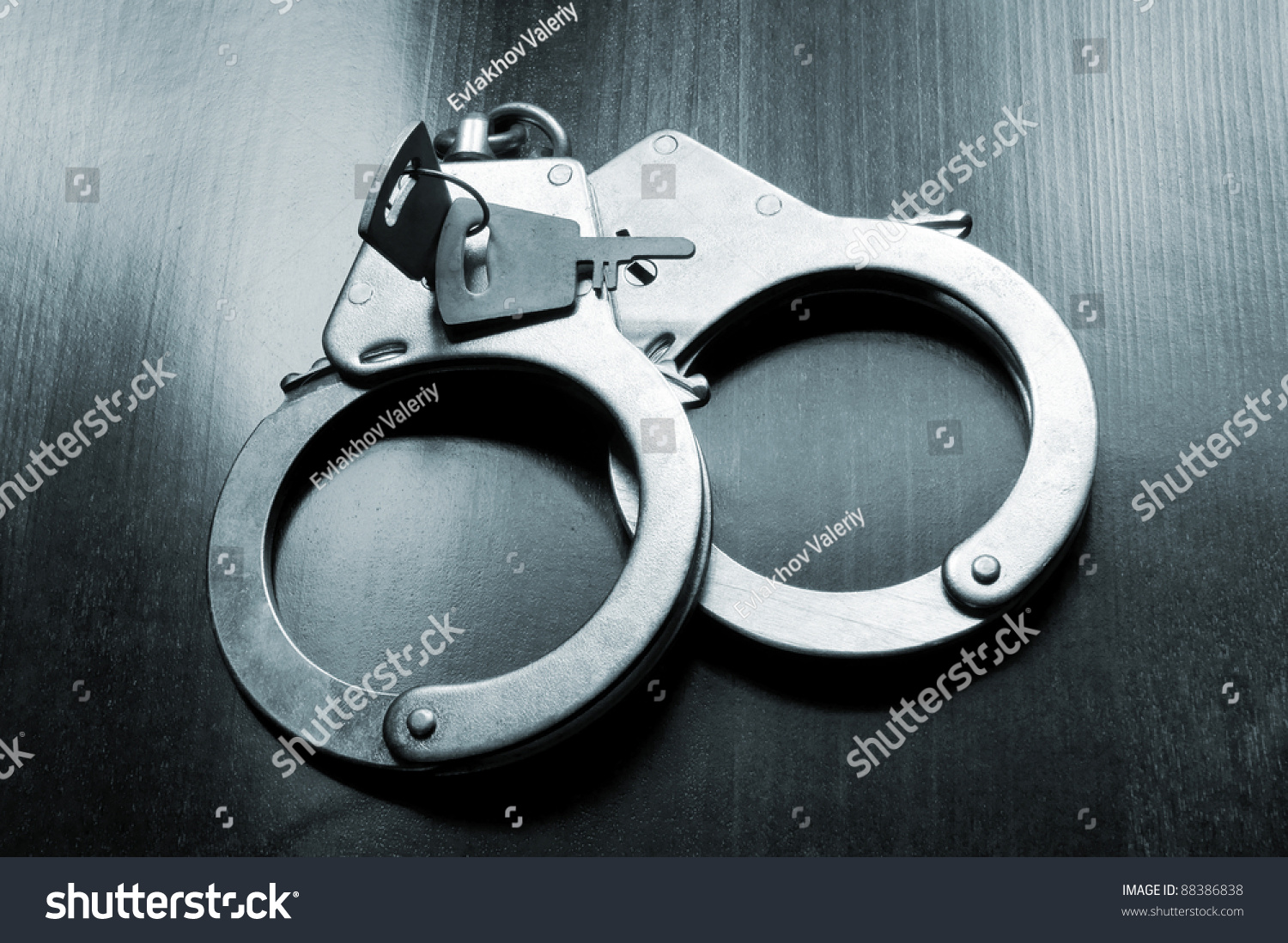 Steel Metallic Handcuffs With Keys On Wooden Table Stock Photo 88386838 ...