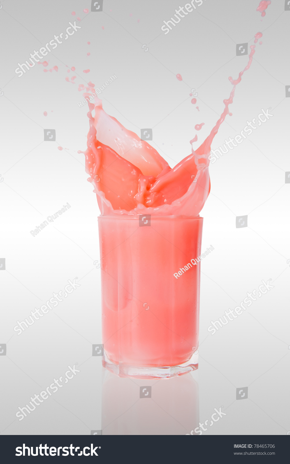 Strawberry Milk Shake Splashing Put Of A Glass On Isolated Back Ground ...