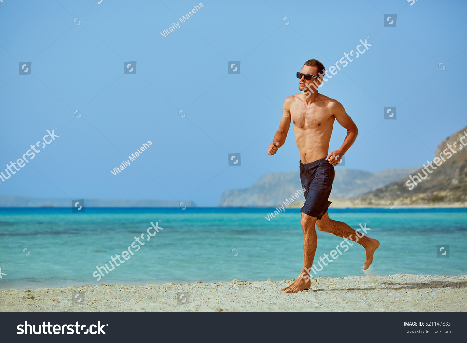 Strong Athletic Man Bared Torso Running Stock Photo (Edit Now) 621147833