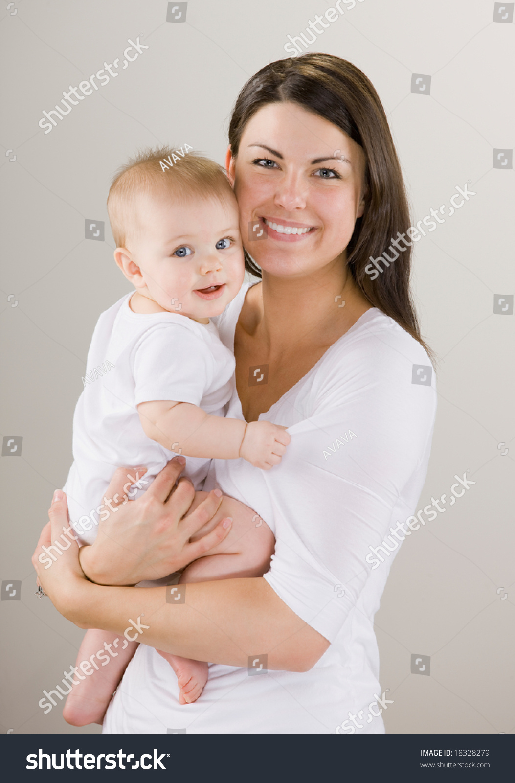 Studio Shot Of Loving Mother Holding Baby Stock Photo 18328279 ...