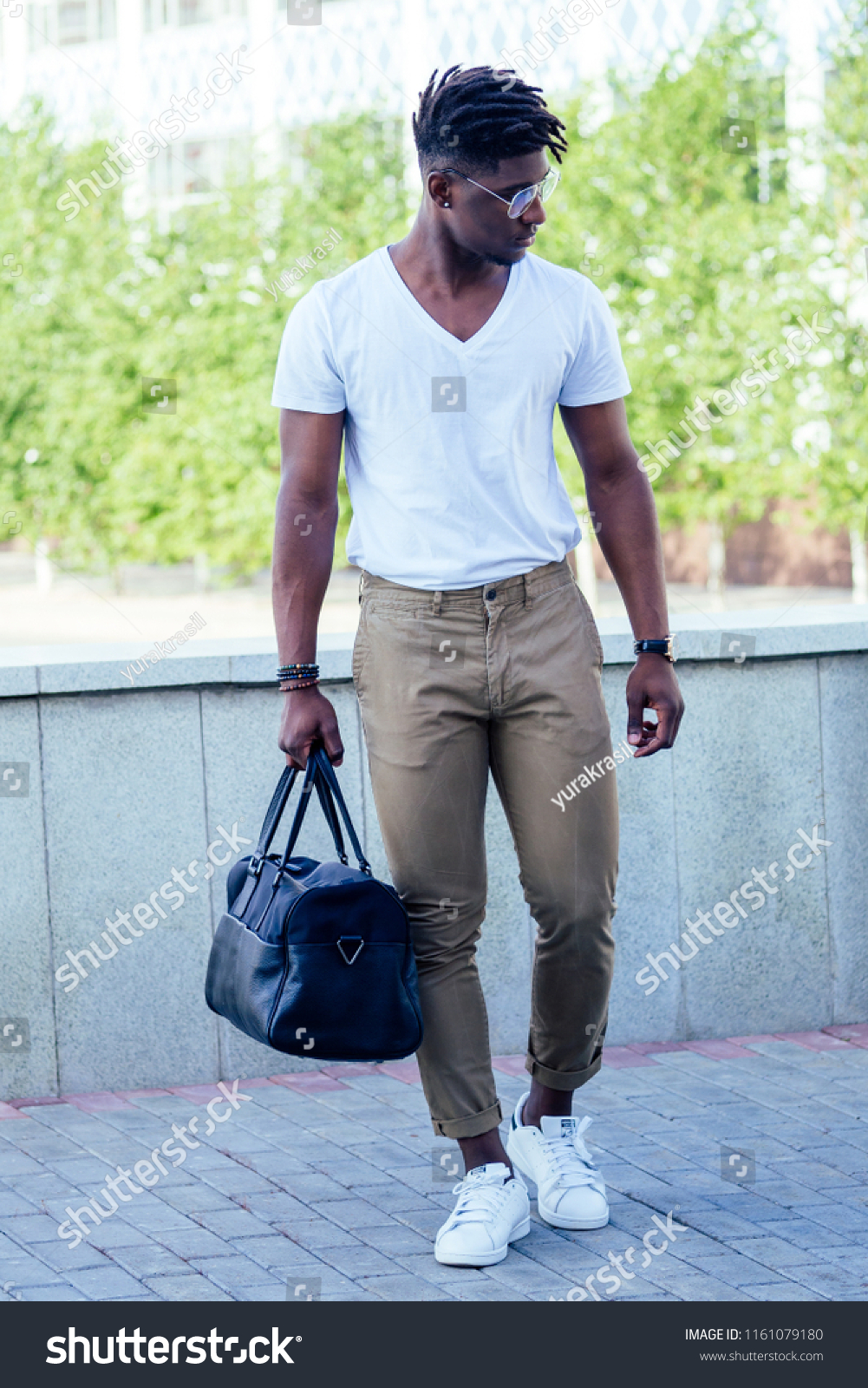 black t shirt brown pants