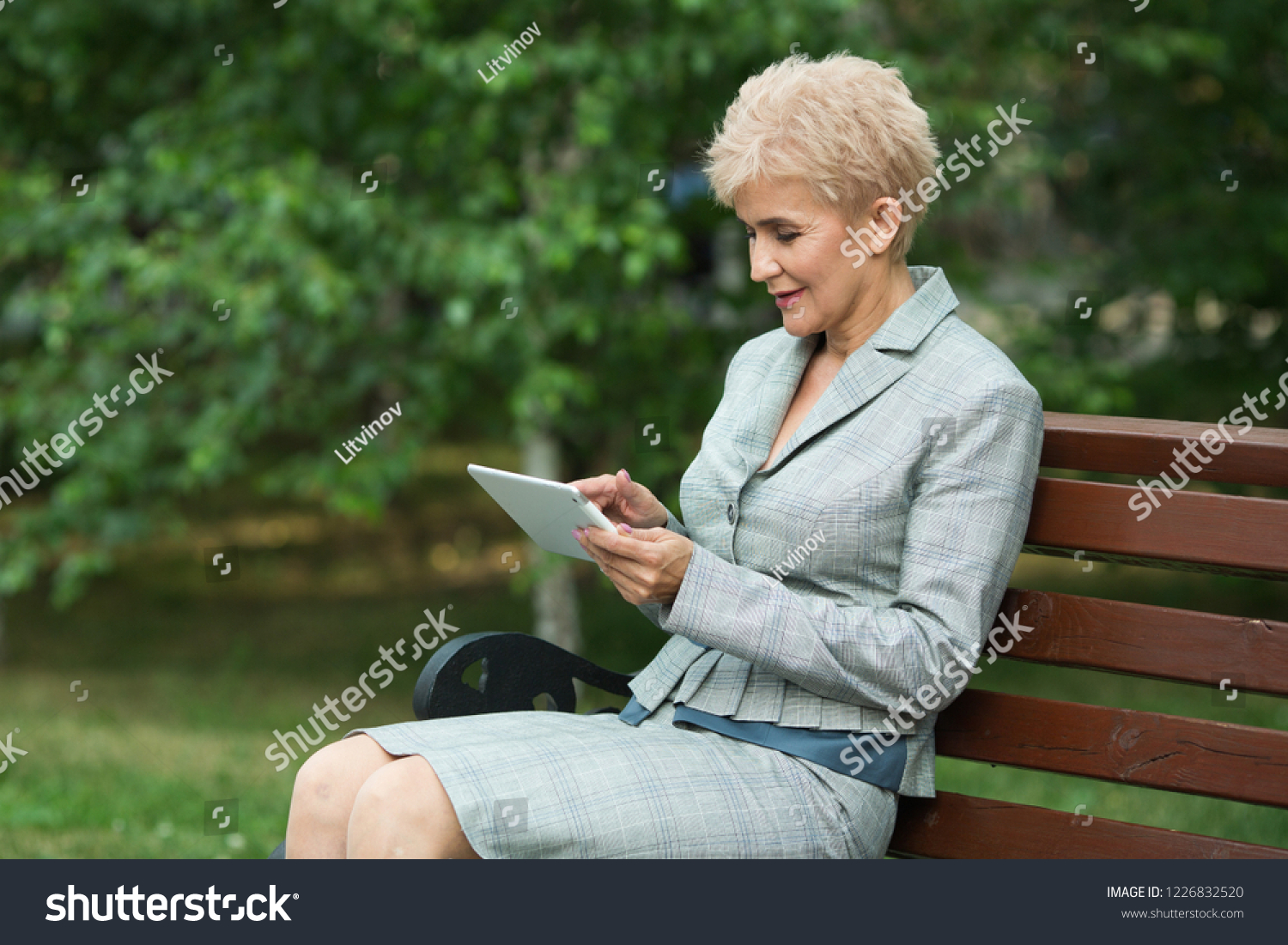 Stylish Elderly Woman Short Haircut Sitting Stock Photo Edit Now