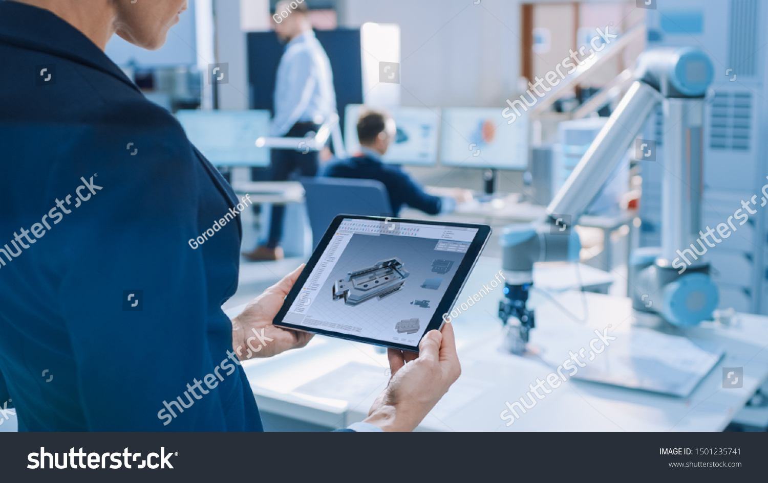 Stylish Female Industrial Robotics Engineer Uses Stock Photo 1501235741