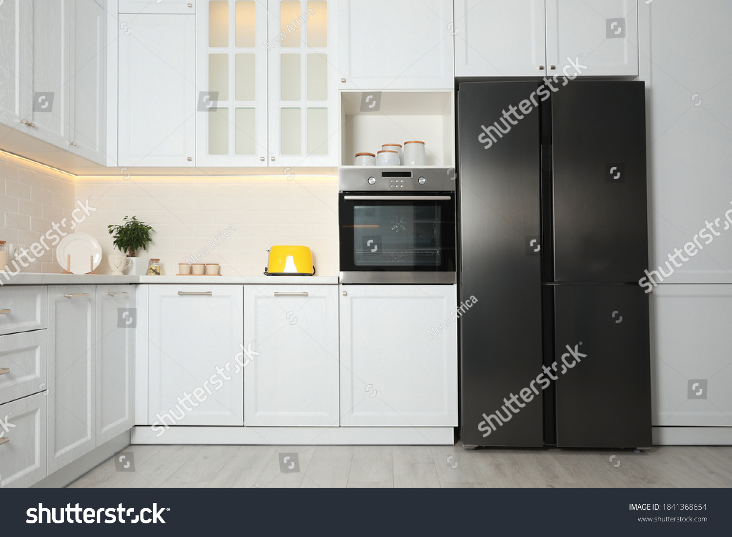 Stock Photo Stylish Kitchen Interior With Modern Steel Refrigerator 1841368654 