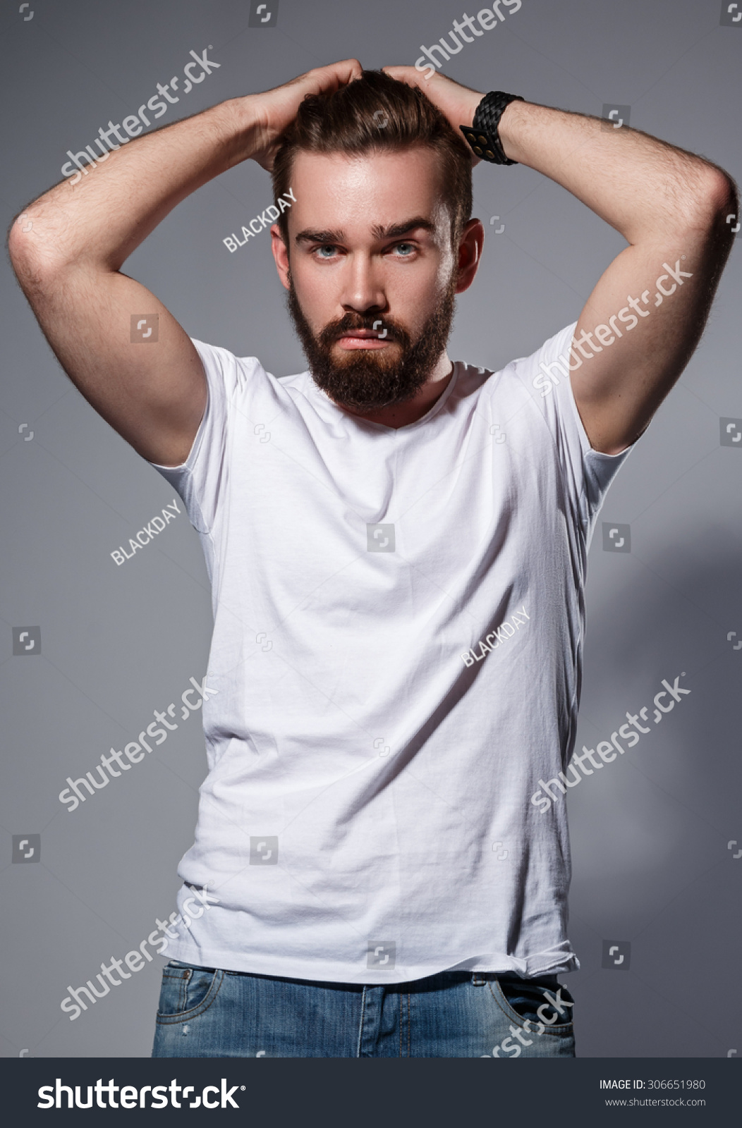 Stylish Man With A Beard Posing In Studio Stock Photo 306651980 ...