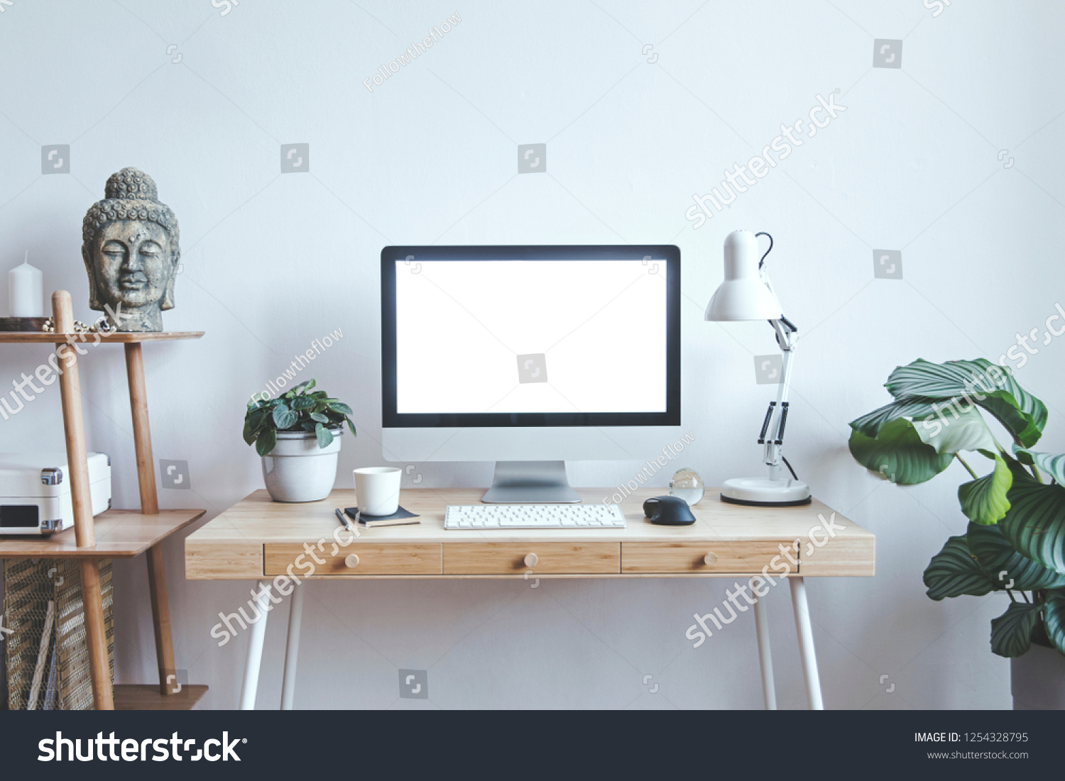 Stock Photo Stylish Scandinavian Interior Of Home Creative Desk With Mock Up Computer Screen Plants Bookstand 1254328795 
