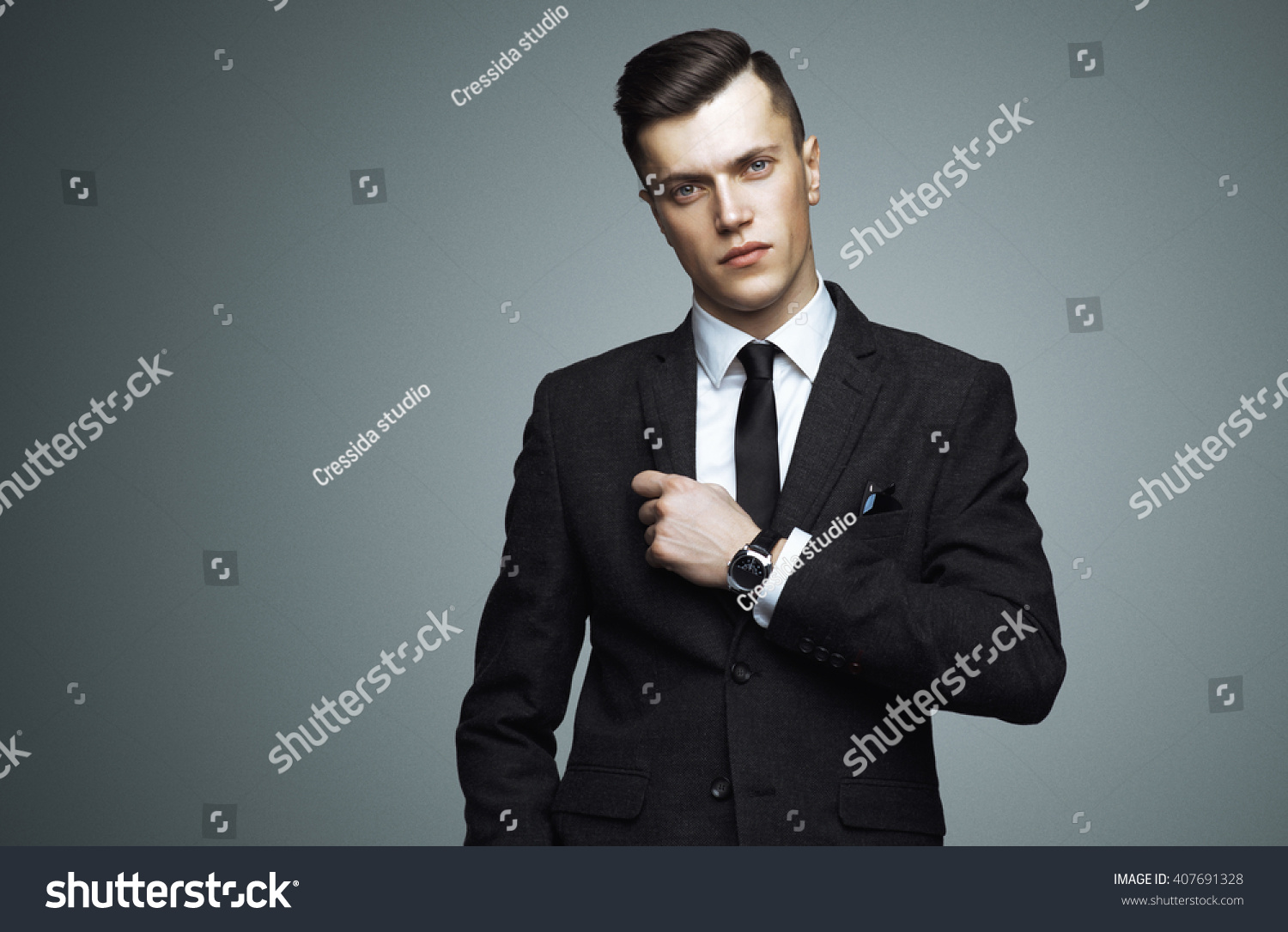 Stylish Young Man In Suit And Tie. Business Style. Fashionable Image ...