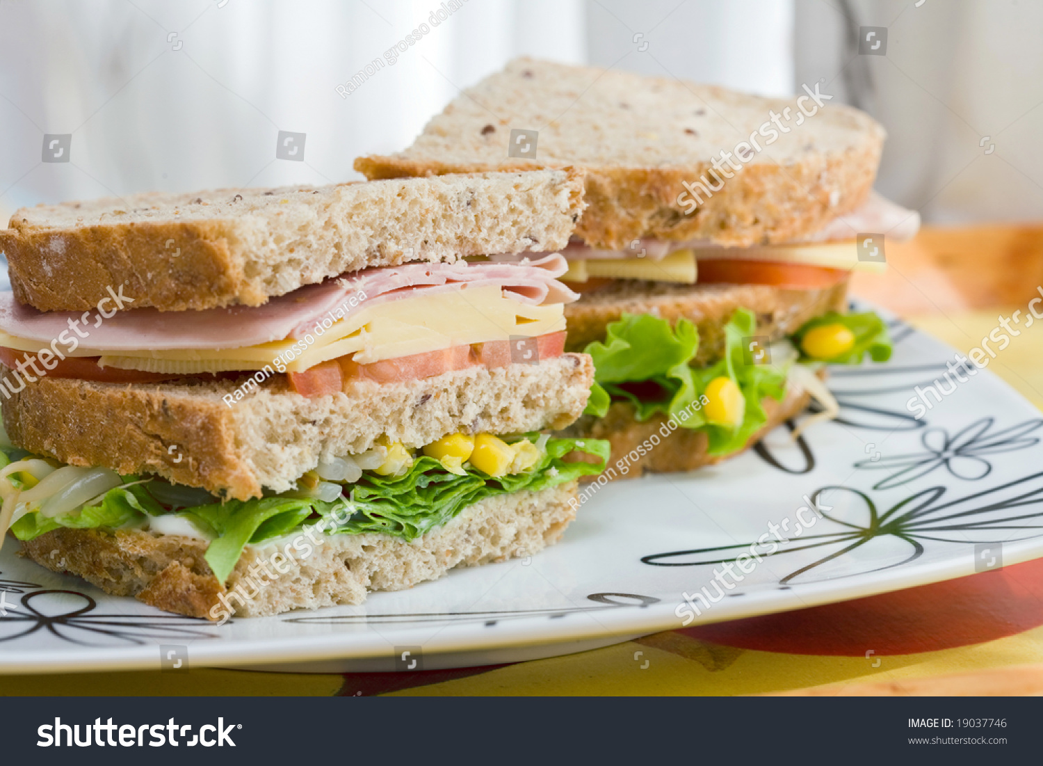 Submarine Sandwich With Whole Grain Bread On Wood Platter Stock Photo ...