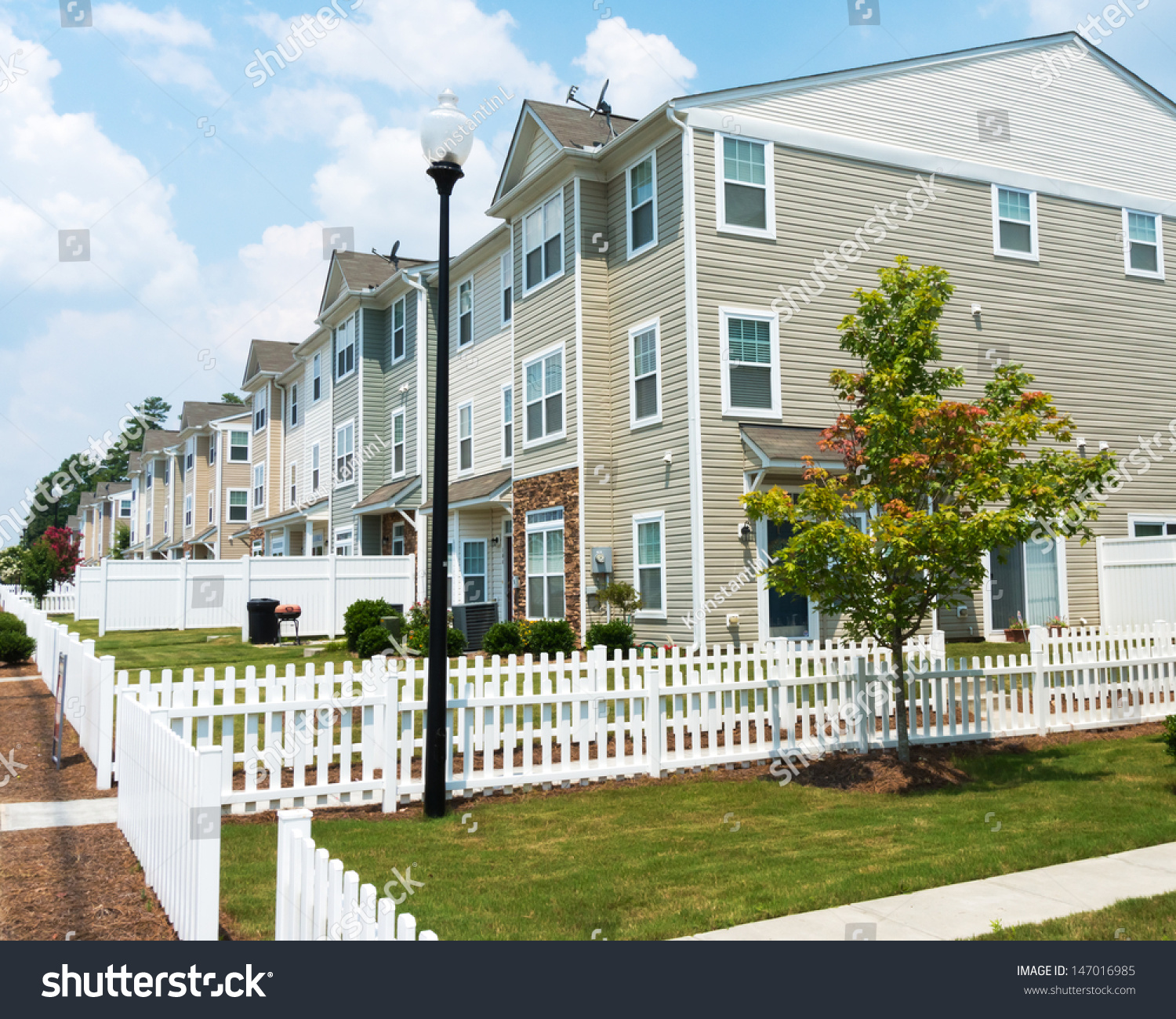 Suburban Three Story Town Homes Stock Photo 147016985 - Shutterstock