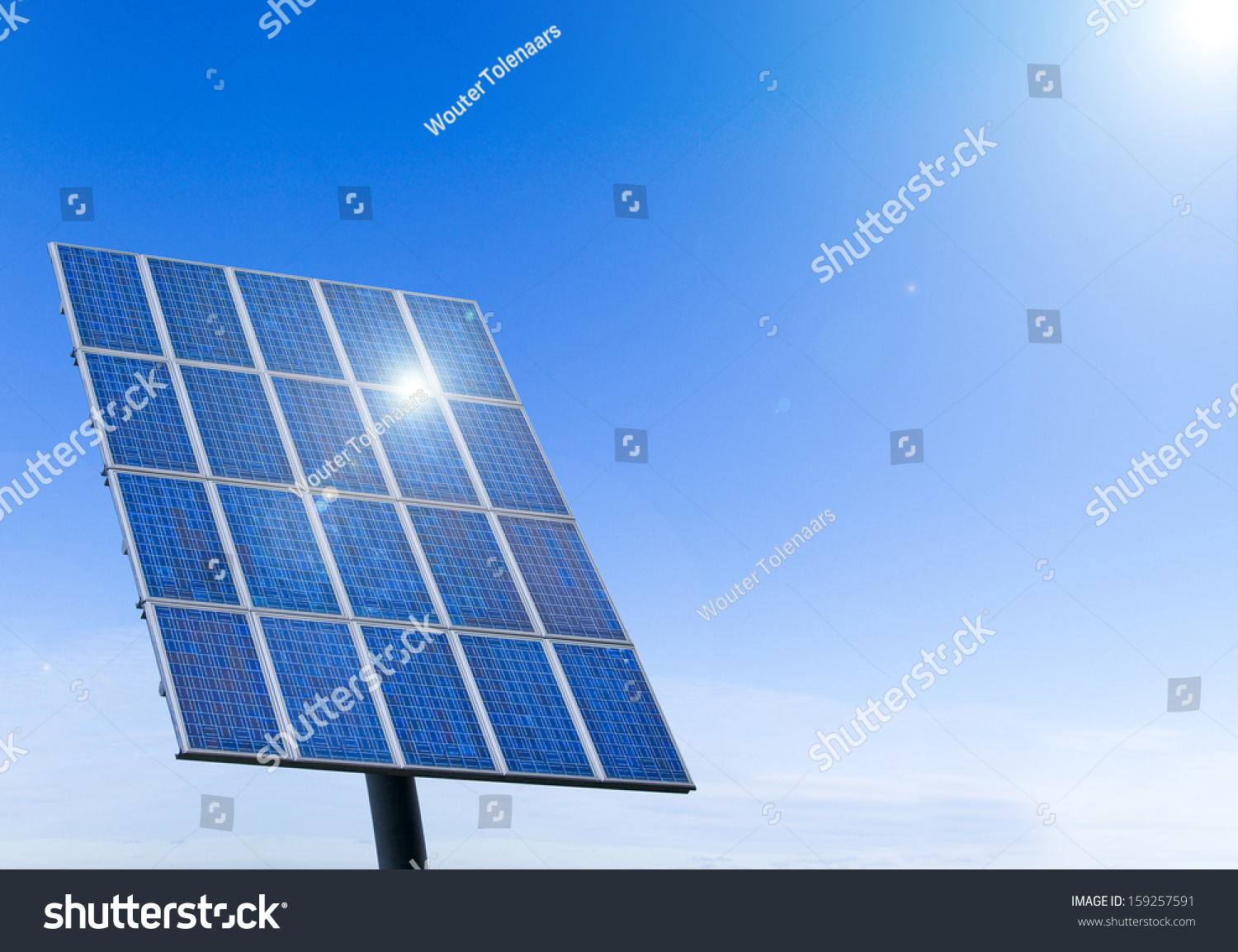 Sun Shining In A Solar Panel Against A Blue Sky Stock Photo 159257591 ...