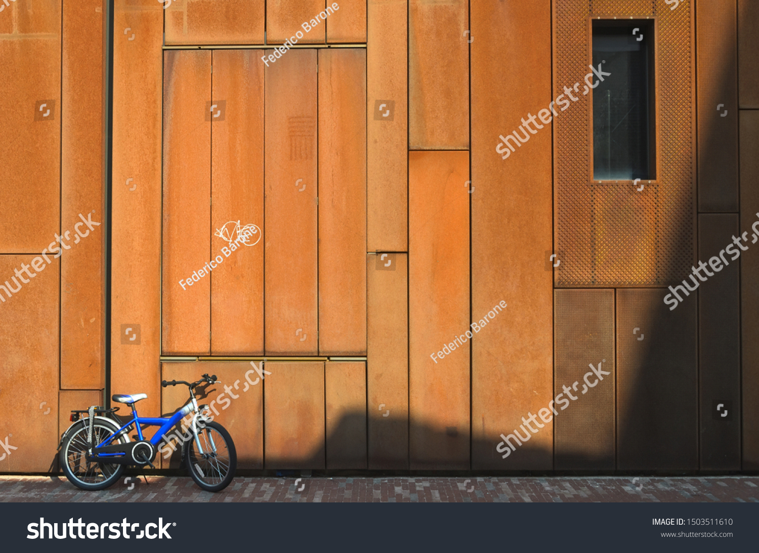 stock-photo-sunny-rusty-facade-of-an-urb