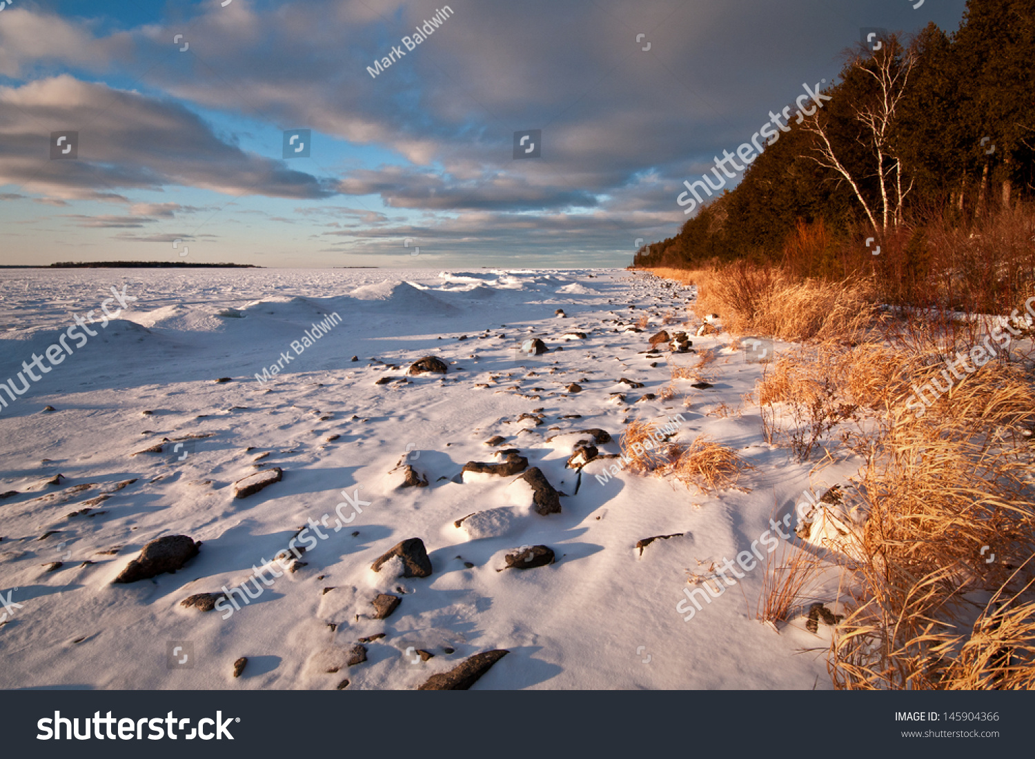 Sunset Light On Winter Shoreline Peninsula Stock Photo Edit