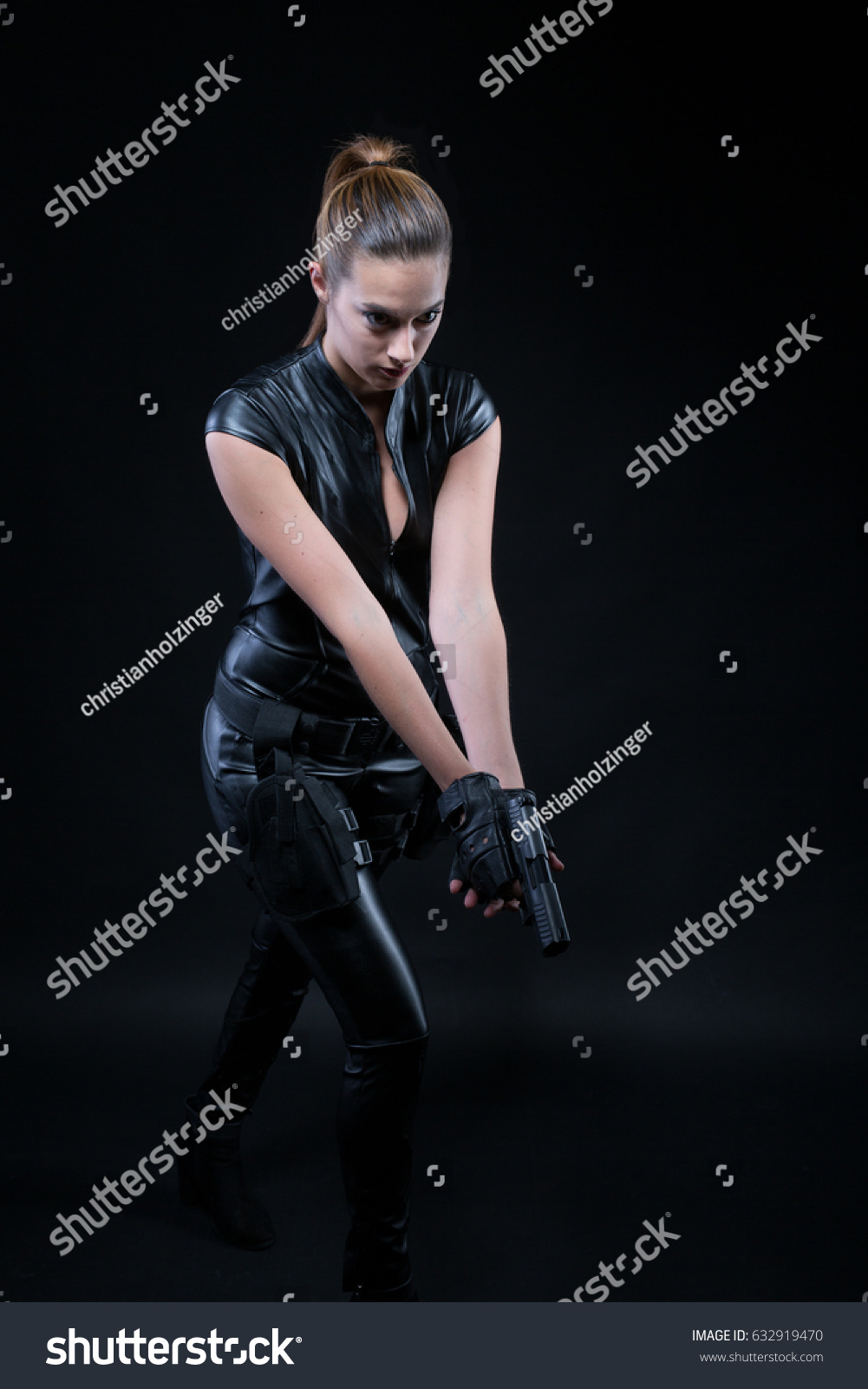 Superhero Police Woman Leather Catsuit Guns Stock Photo Edit Now 632919470 Superhero Police Woman Leather Catsuit Guns Stock Photo Edit Now 632919470