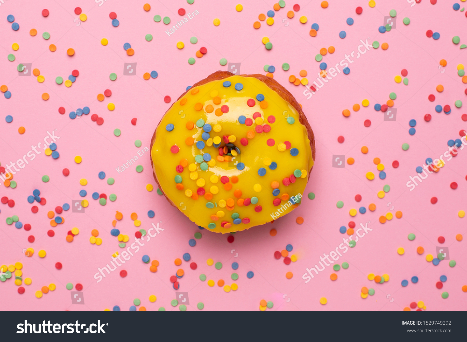 Download Sweet Yellow Donut Sprinkle On Pink Stock Photo Edit Now 1529749292 PSD Mockup Templates