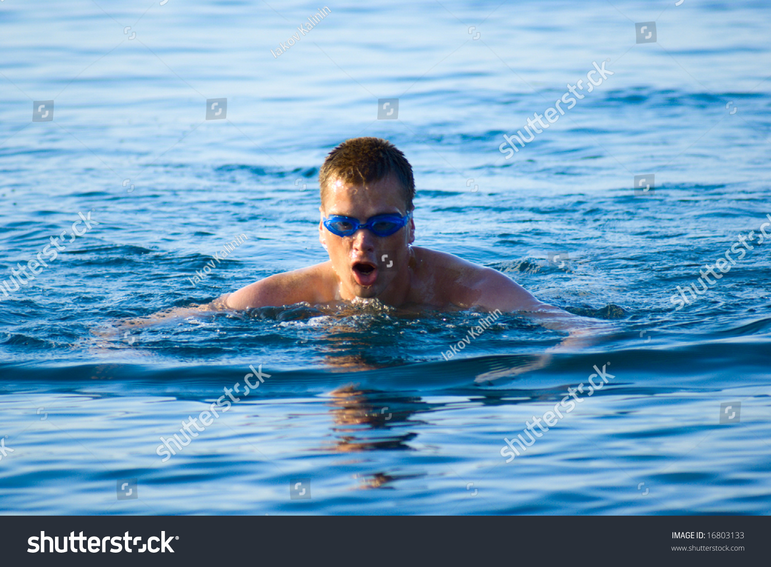 Swimming Man In Ocean Water Stock Photo 16803133 : Shutterstock