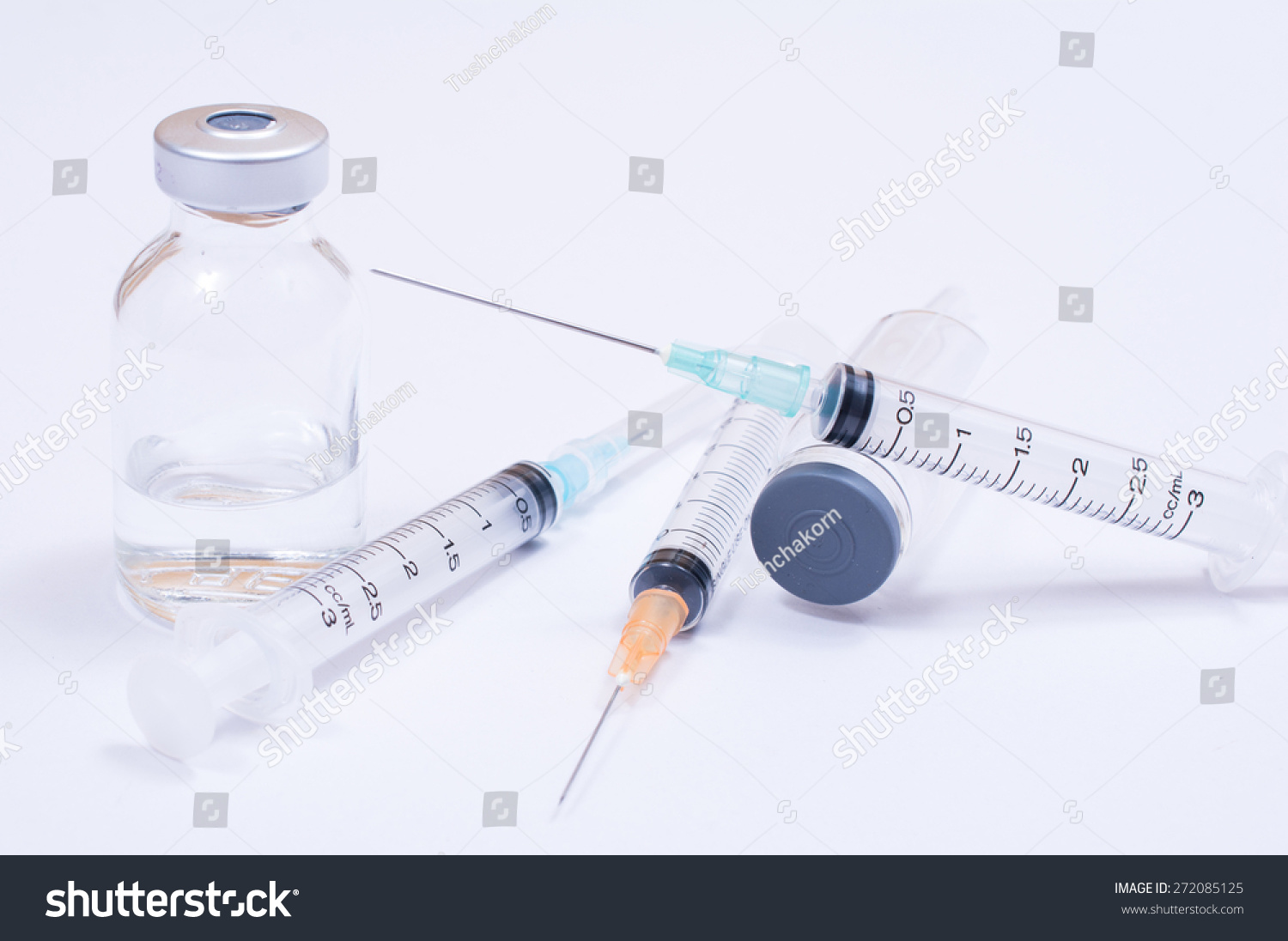 Syringe With Droplet And Medical On White Background. Stock Photo 