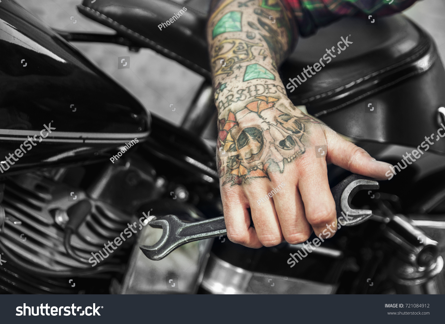 Tattooed Hand Holding Wrench Next Motorcycle Stock Photo Edit Now 721084912