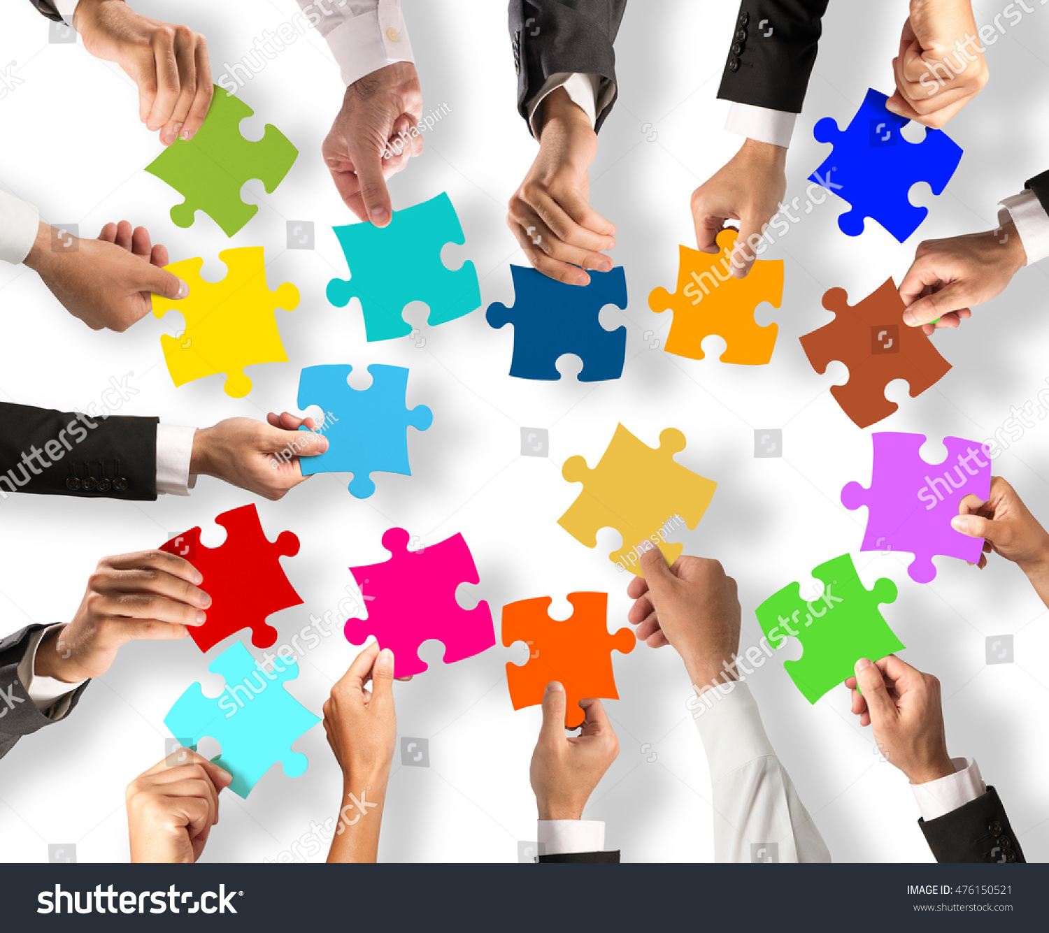 Teamwork And Integration Concept With Puzzle Pieces Stock Photo ...