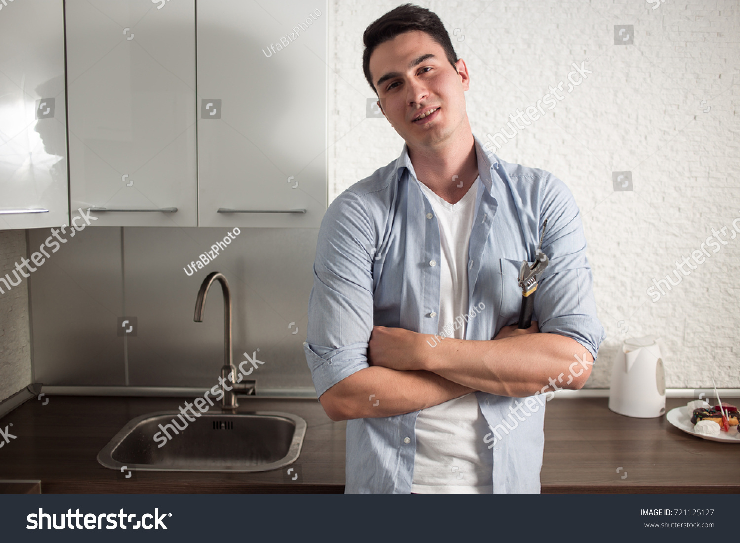 Technician Servicing Hot Water Heater Plumber Stock Image