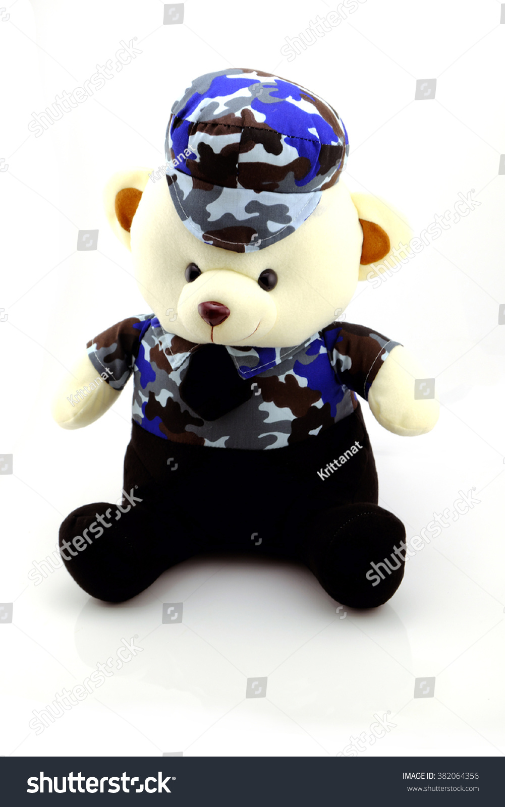 teddy bear wearing a suit