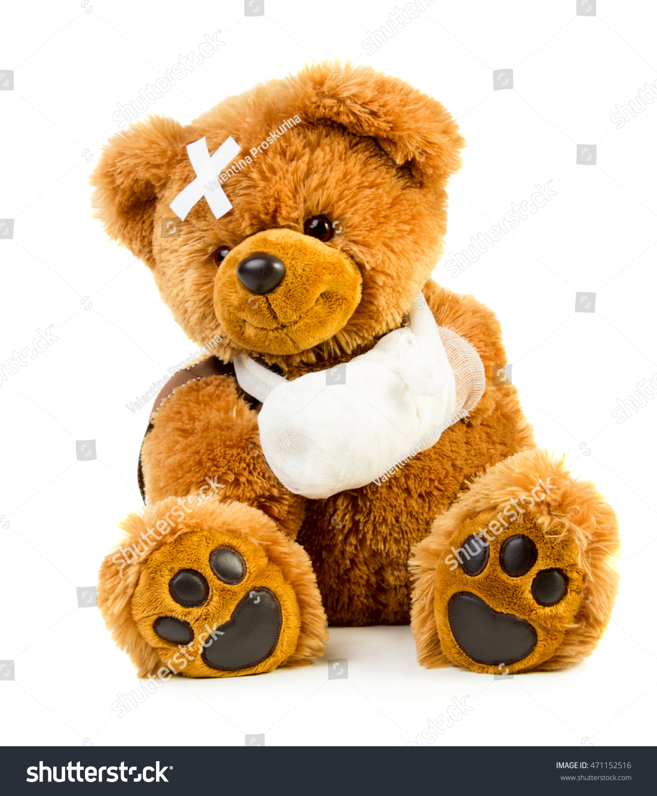 teddy bear with bandage on head