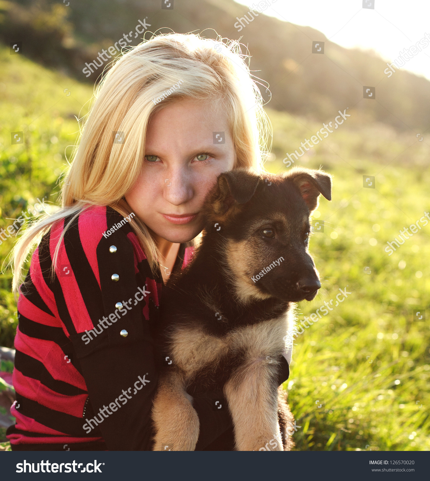 Teen Girl Holding German Shepherd Puppy Stock Photo 126570020 ...